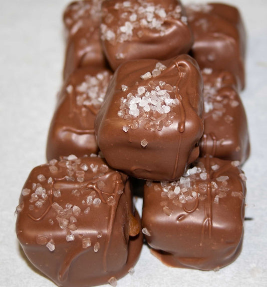 Sea salt chocolate covered caramels with gooey caramel center