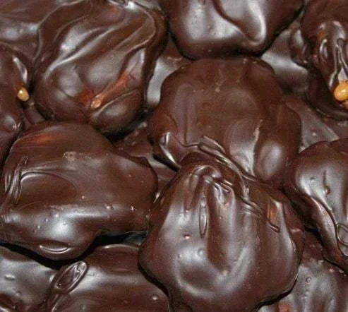 Caramel pecan clusters covered in chocolate from Mantorville Farms