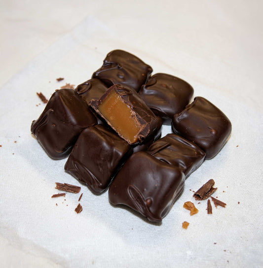 Hand-dipped chocolate covered caramels with gooey caramel center