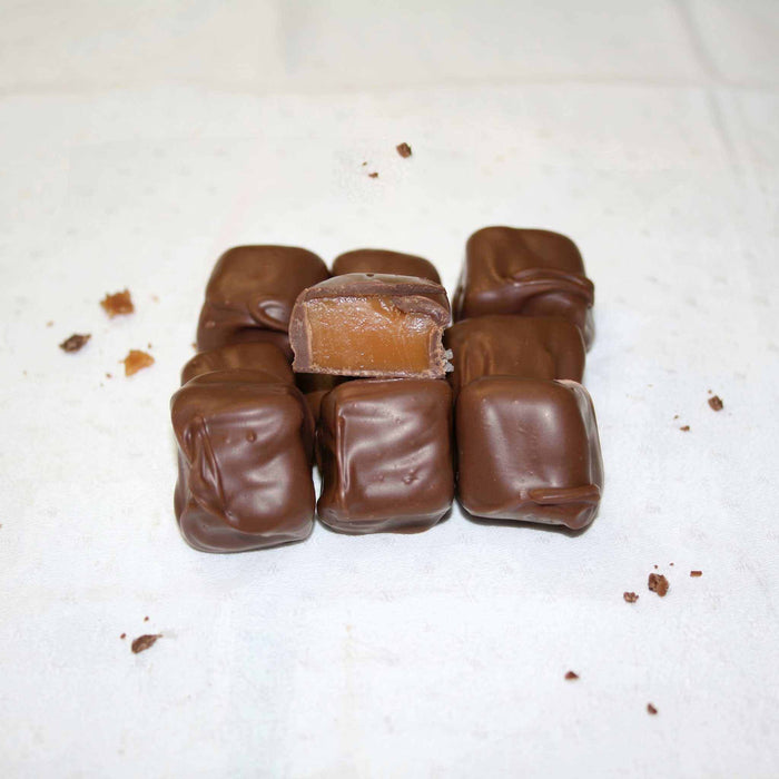 Hand-dipped chocolate covered caramels with gooey caramel center