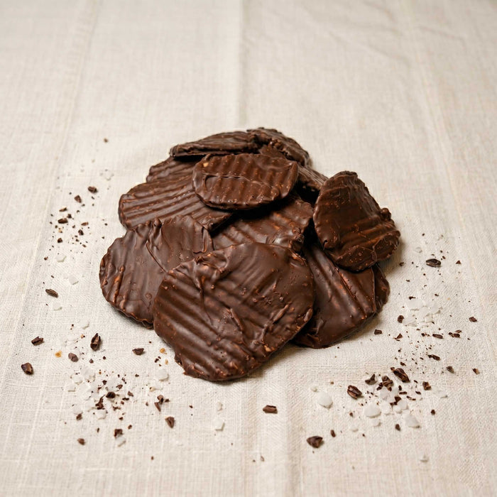 Close-up of crunchy potato chips coated in chocolate